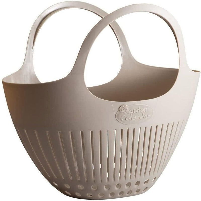Beige plastic garden colander basket with dual handles and vertical drainage slots