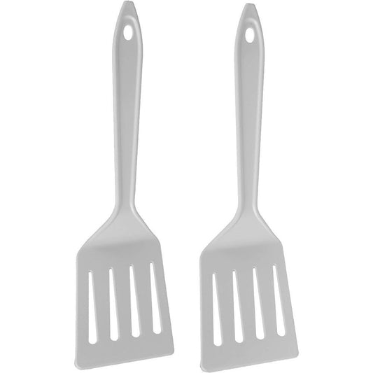Pair of white reinforced nylon slotted turner spatulas on white background